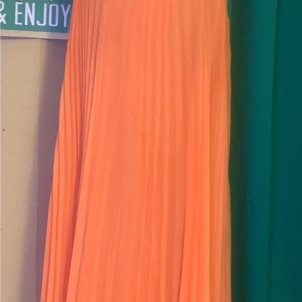 Elegant Pleated Sleeveless Midi Dress  exactly needed for an afternoon wedding